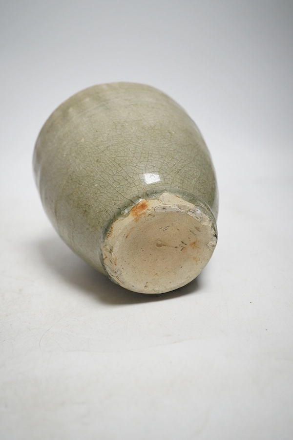 A Chinese celadon vase, 16cm high. Condition - fair to good
